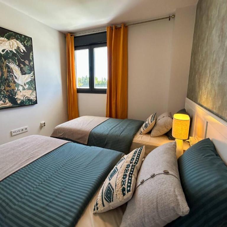 Apartamento con Terraza y Vista al Jardín - Apartamento de 2 dormitorios - 73