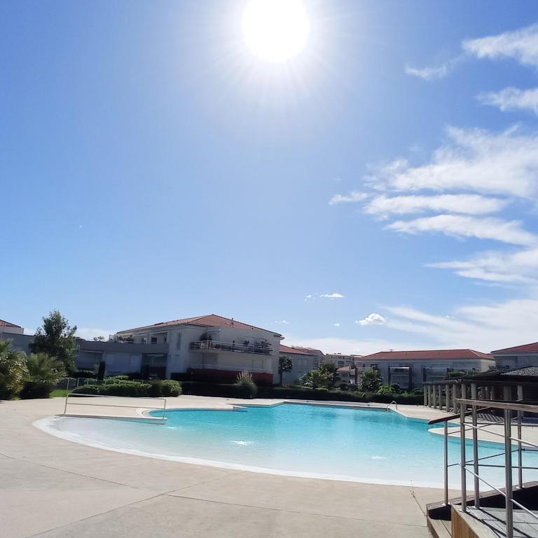 Bel appartement en bord de mer avec piscine lagon et jardin, en résidence sécurisée - Appartement 2 Chambres - 47