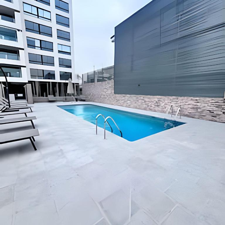 Refugio urbano con estilo y confort - One-Bedroom Apartment - 23