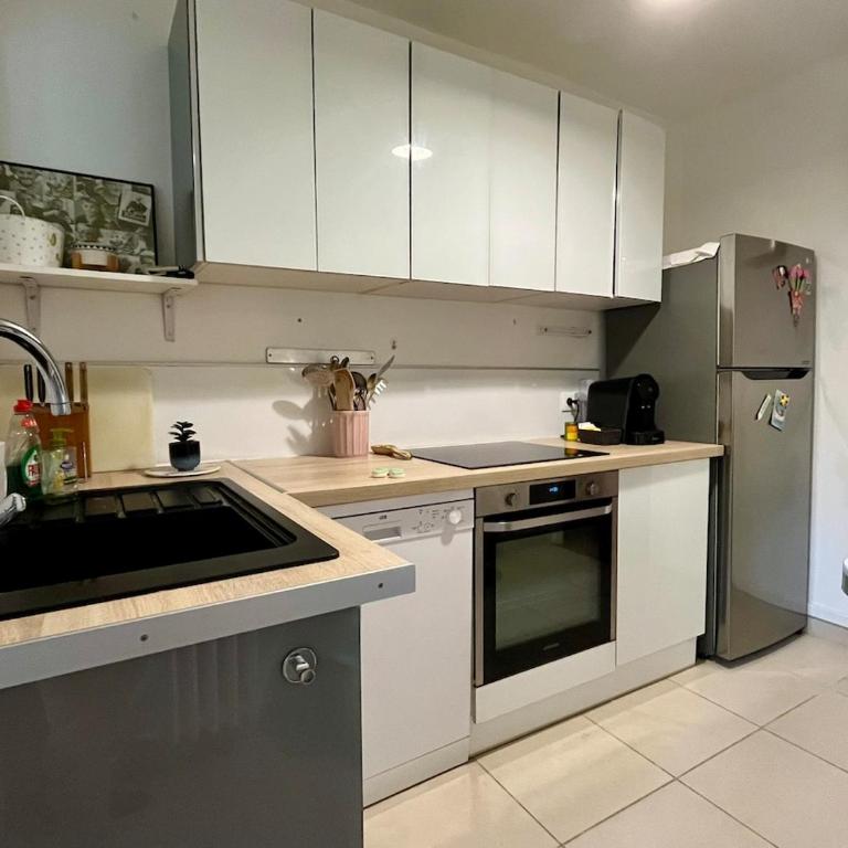 Appartement Odysée-Plage - Three-Bedroom Apartment - 25