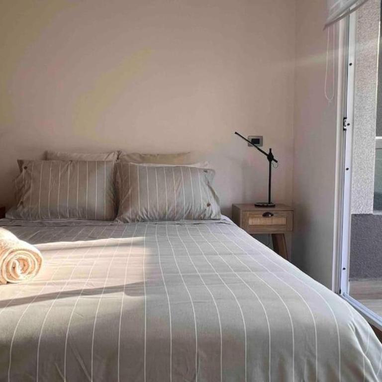 Comodo con aire acondicionado y estacionamiento - Apartment - 7