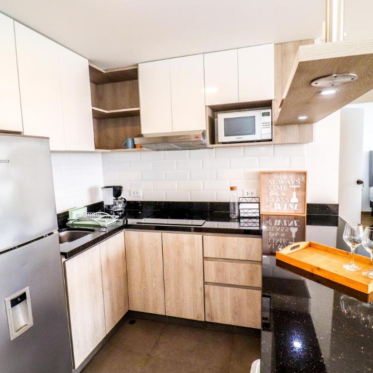 Moderno departamento para tus vacaciones o trabajo en San Miguel - Apartamento con balcón - 11