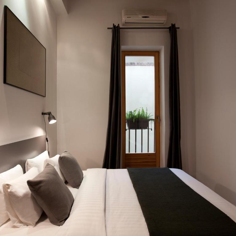 Centric Gracia Apartments - Three-Bedroom Apartment - 1
