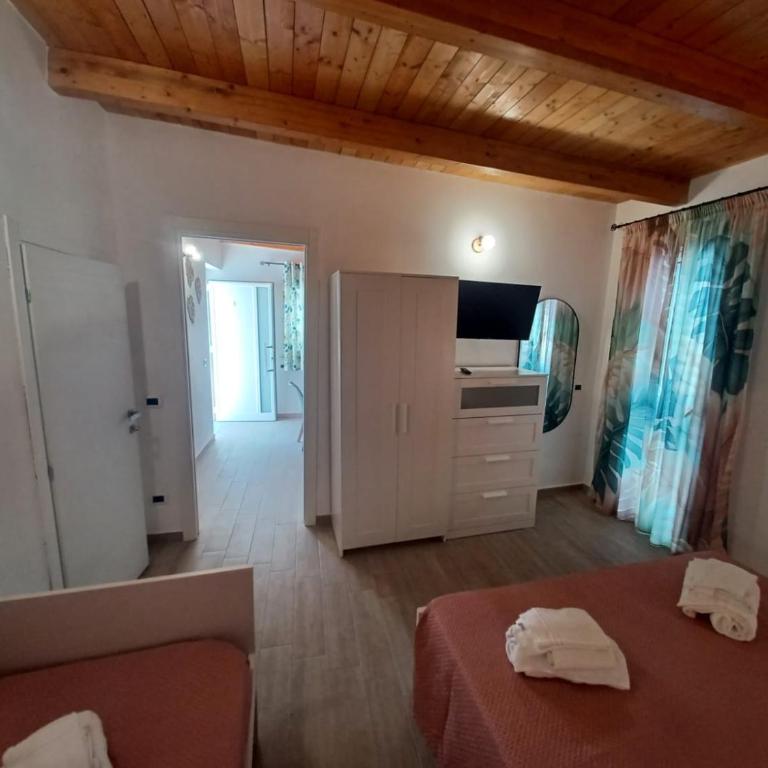 Locazione Turistica Sole Mare - Camera Quadrupla con Balcone - 5