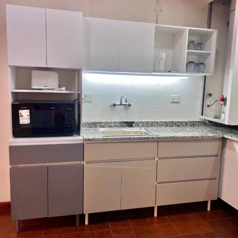 Amplio departamento renovado en el centro de la ciudad - Apartamento - 2 niveles - 23