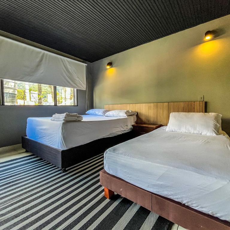 ANTONIA Hotel Autónomo en Ibagué - Recepción Digital 24H - Habitación Triple con baño privado externo - 10