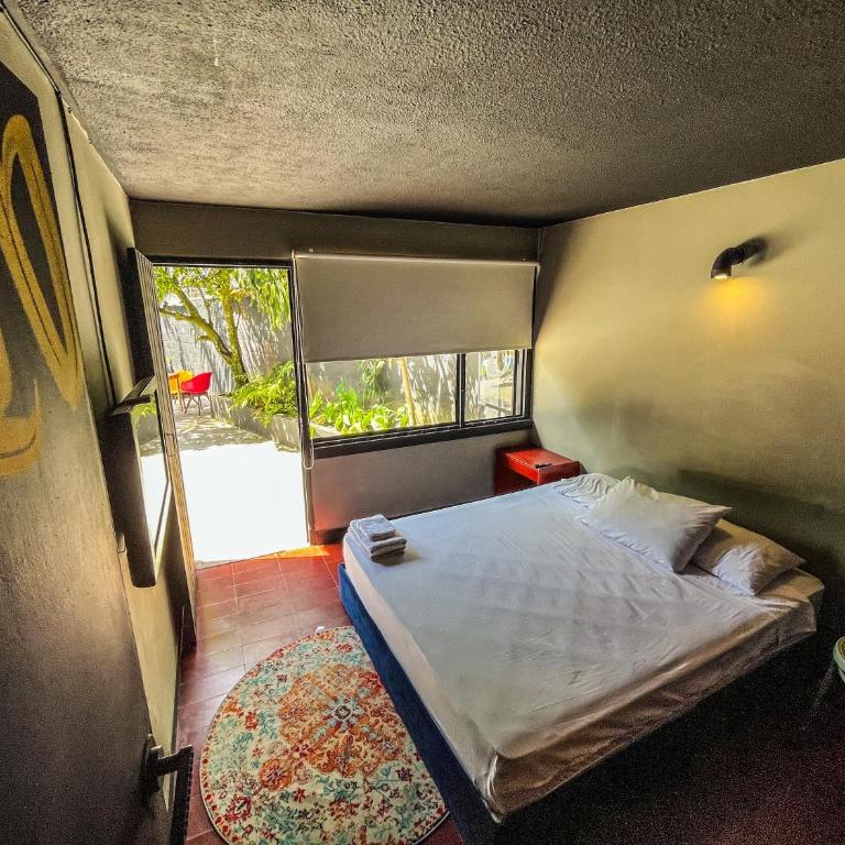 ANTONIA Hotel Autónomo en Ibagué - Recepción Digital 24H - Habitación Doble con vistas a la piscina - 5