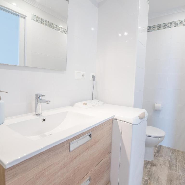 Apartamentos Óliver Playa - Apartamento de 2 dormitorios con terraza y vistas parciales al mar - Tercera planta - 12