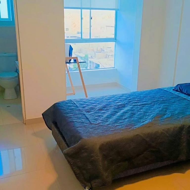Departamento con cochera - Condominio Las Flores - Two-Bedroom Apartment - 9