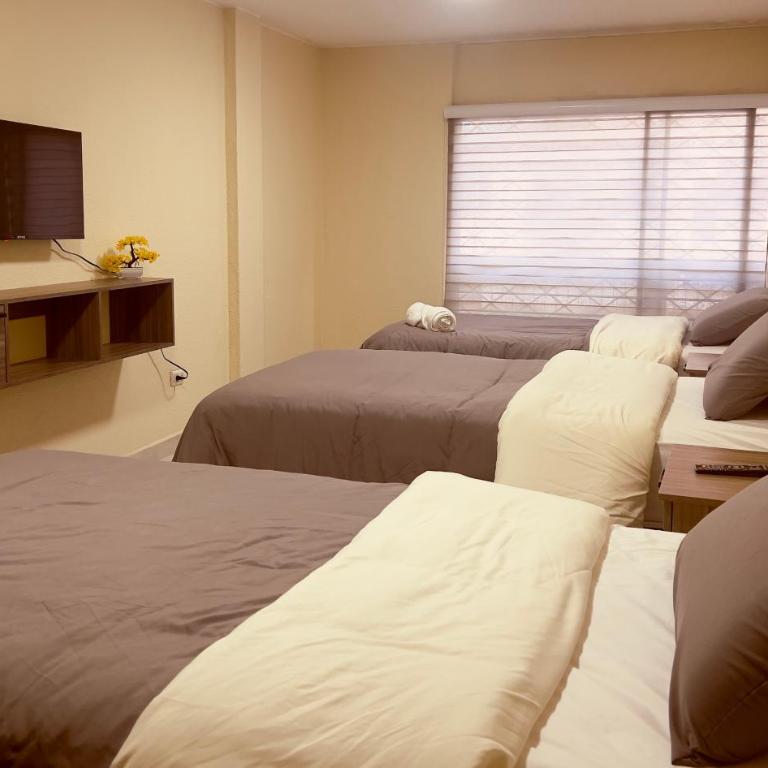 AShostEcuador, Quito, rooms & suits, Quito cerca parque La Carolina - Habitación Triple - 8