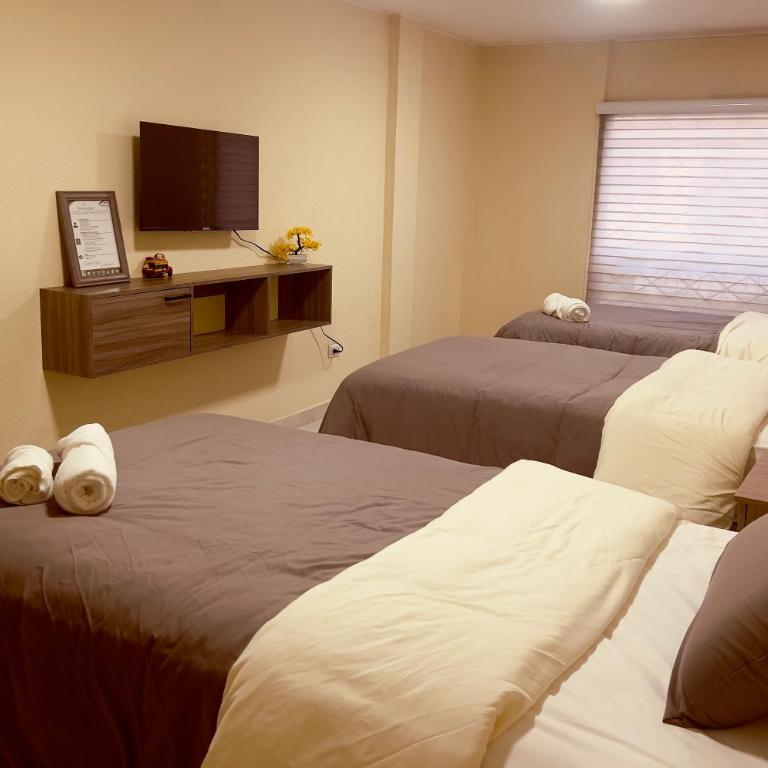 AShostEcuador, Quito, rooms & suits, Quito cerca parque La Carolina - Habitación Triple - 7