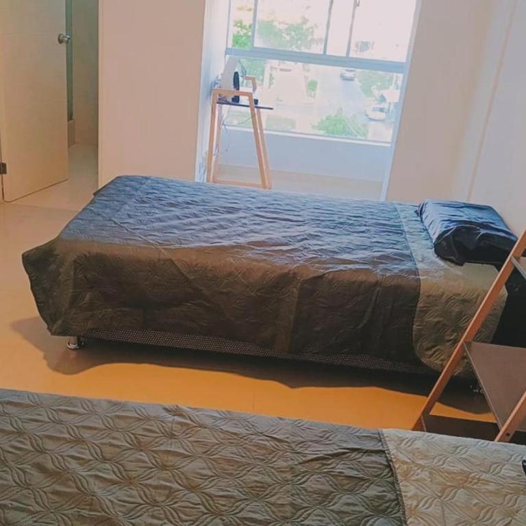 Departamento con cochera - Condominio Las Flores - Apartamento de 2 dormitorios - 3