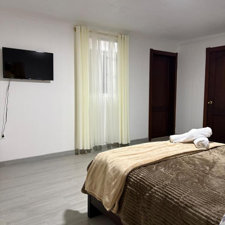 Casa moderna familiar para estadías confortables - Three-Bedroom Home - 18