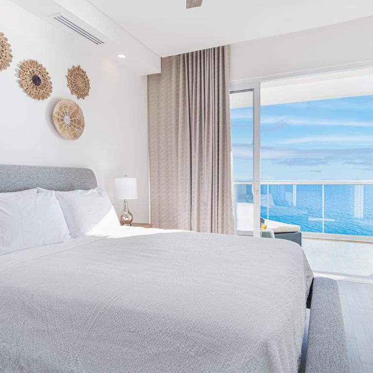 Sandy Paws 2 bedroom 2 bath Ocean Front Encantame Towers C1604 - Casa - 12