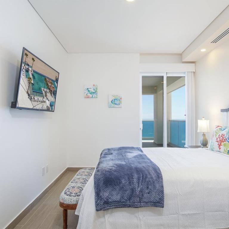 Confortable 2 bedroom condo Encantame Towers Verano 905 - Casa - 20