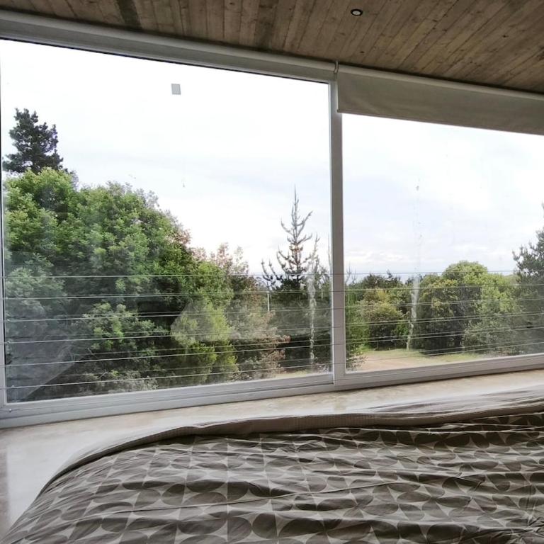 Concrete house overlooking the ocean and beach access - One-Bedroom House - 7