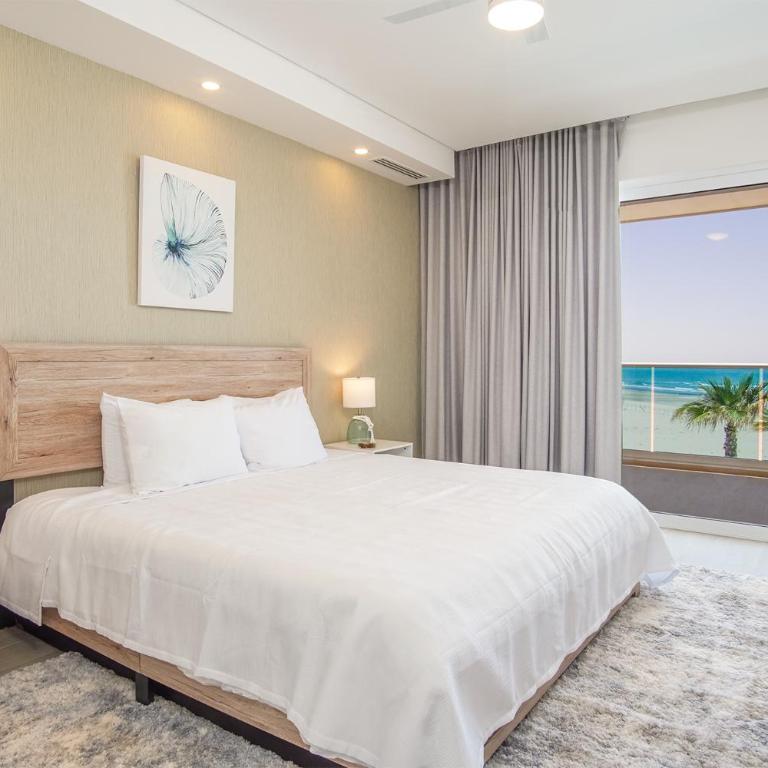 Cozy beach front getaway Encantame Towers E304 - Casa - 17