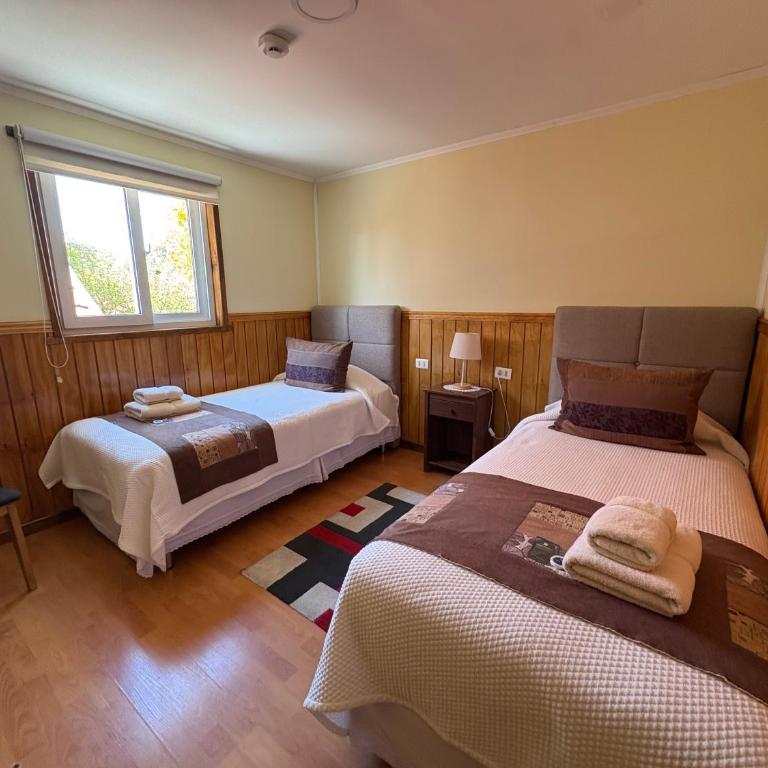 Hostal America en Puerto Natales - Habitación Doble - 2 camas - 4