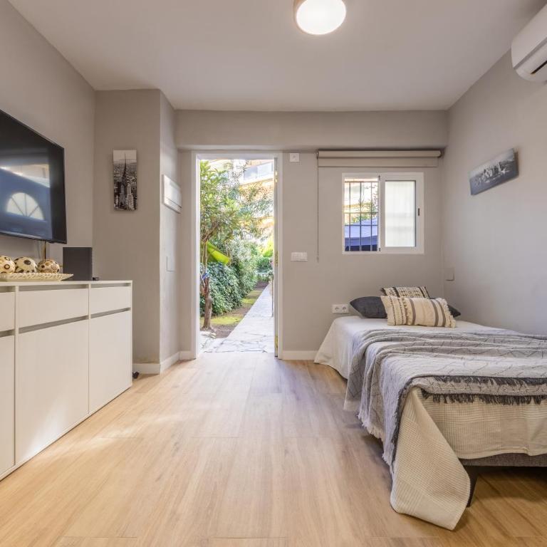 Moderno, con acceso y Jardín Privado, Playa a 50 m - One-Bedroom Apartment with Garden - 19