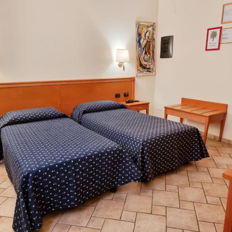 Hotel Giotto - Camera Doppia con Letti Singoli - 1