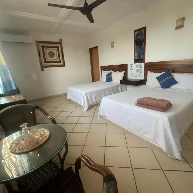 Hotel Careyes Puerto Escondido - Habitación cuádruple - 4