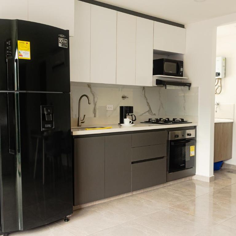 Frente al mall Viva Envigado, AC, moderno - Two-Bedroom Apartment - 1