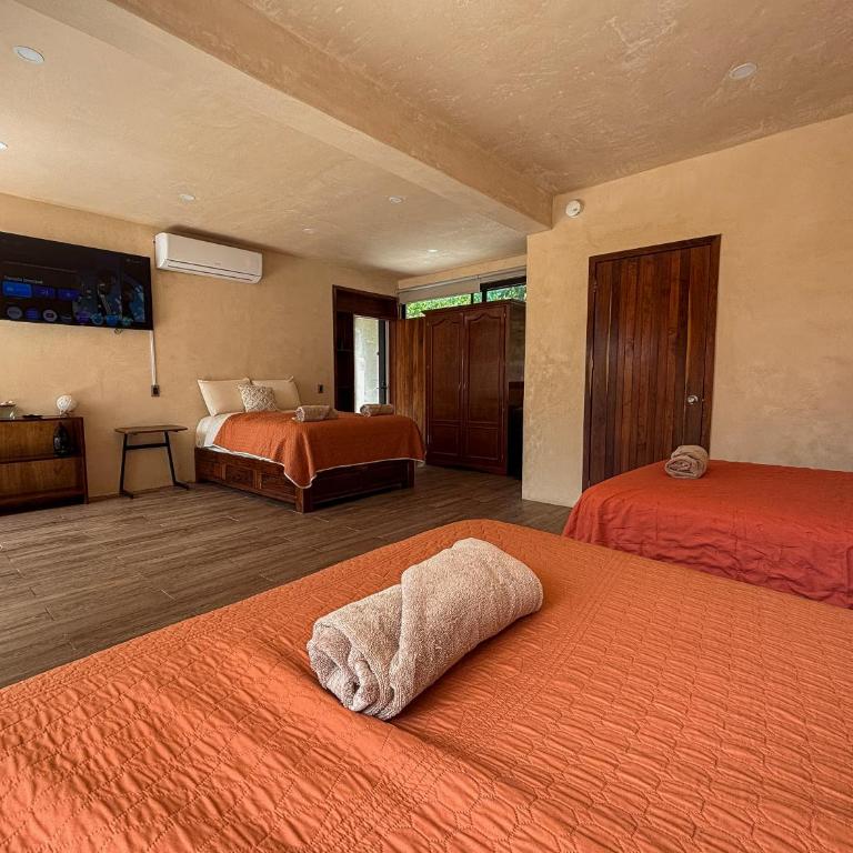 Villas Mandarina Bacalar - Habitación Triple con vistas al jardín - 2