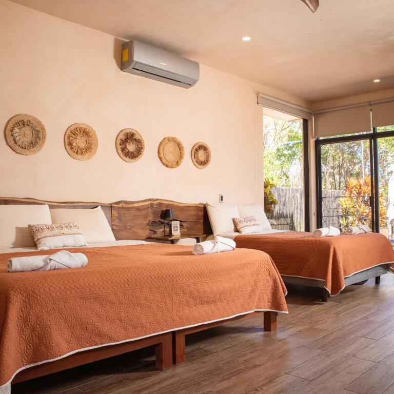 Villas Mandarina Bacalar - Suite con cama extragrande y vistas al mar - 7