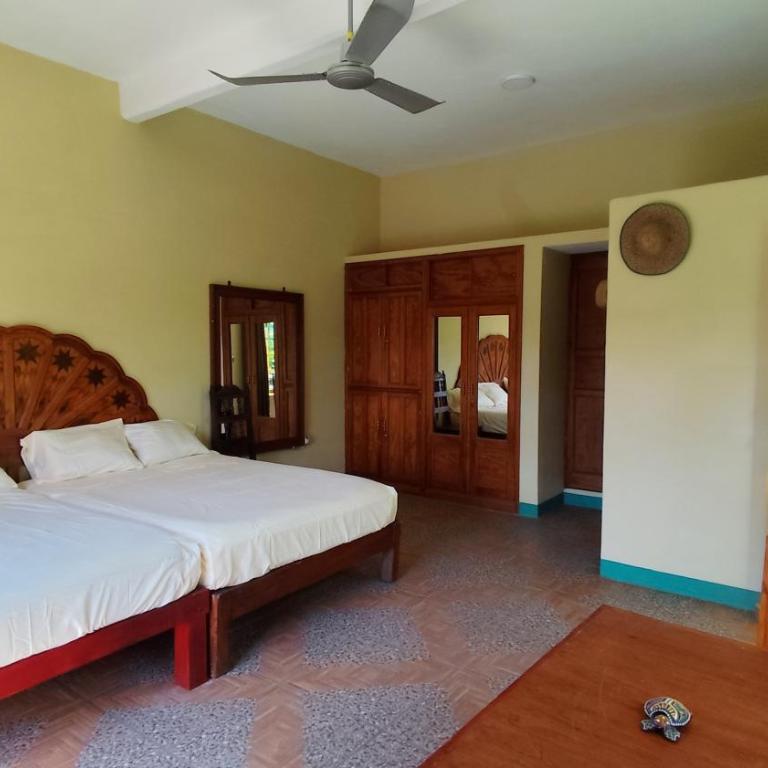 Jungle Palace hostel santaella - Habitación Familiar con vistas al jardín - 1