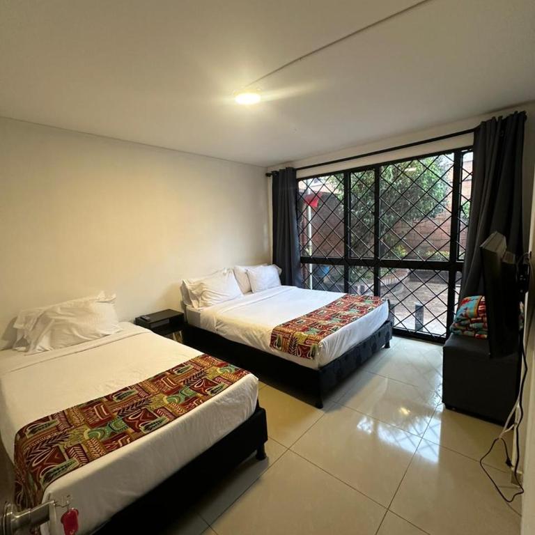 Bamuka Hostal - Habitación Familiar Estándar - 1