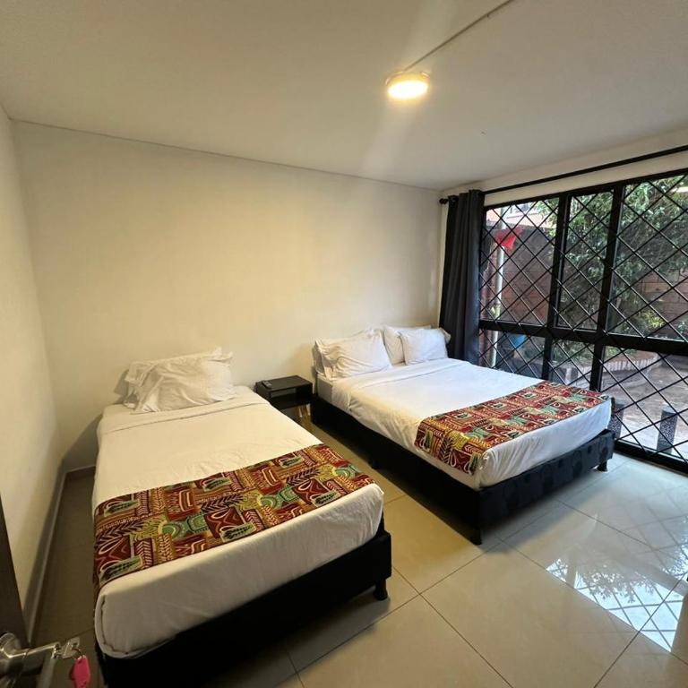 Bamuka Hostal - Habitación Familiar Estándar - 2