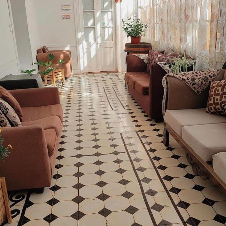 Hostal 4 Estaciones - Habitación Cuádruple Económica con baño compartido - 31