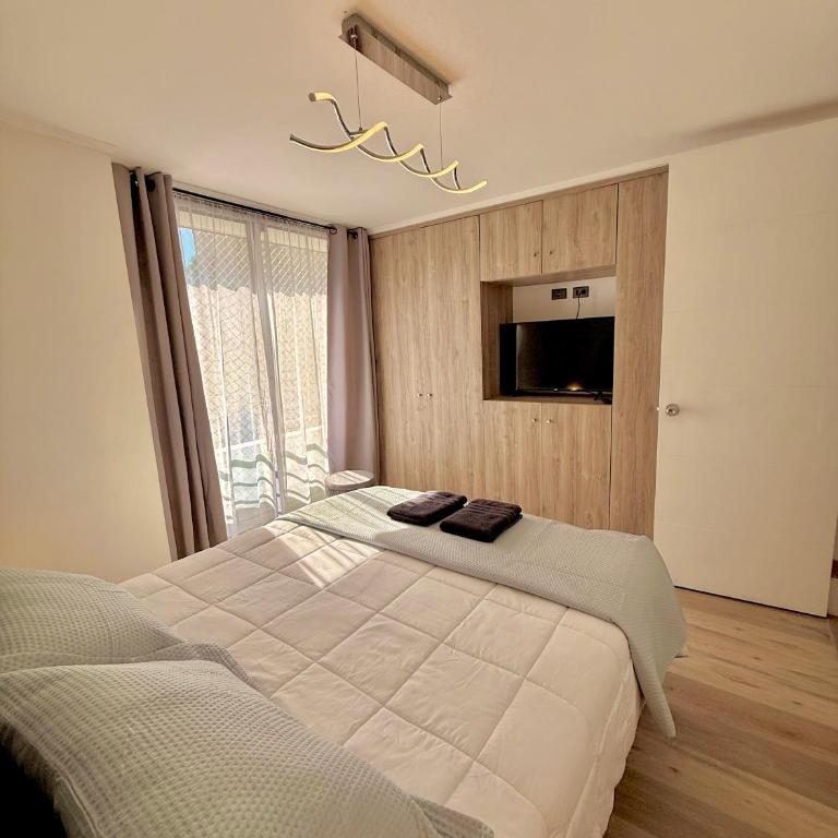 Bello Depa con parqueadero gratis y ubicación insuperable cercano a shoppings y puntos turísticos - Two-Bedroom Apartment - 13