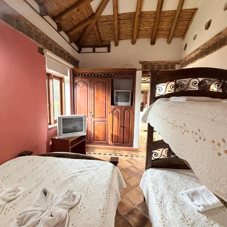 La Casa Colonial - Three-Bedroom House - 35