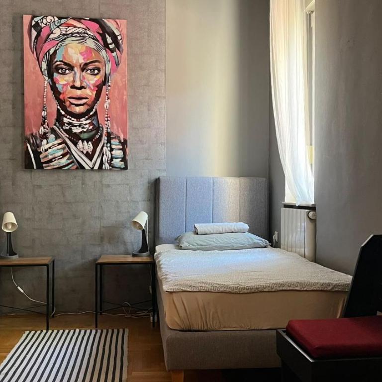 HostelChe Hostel - Osnovna Trokrevetna Soba sa Zajedničkim Kupatilom - 2