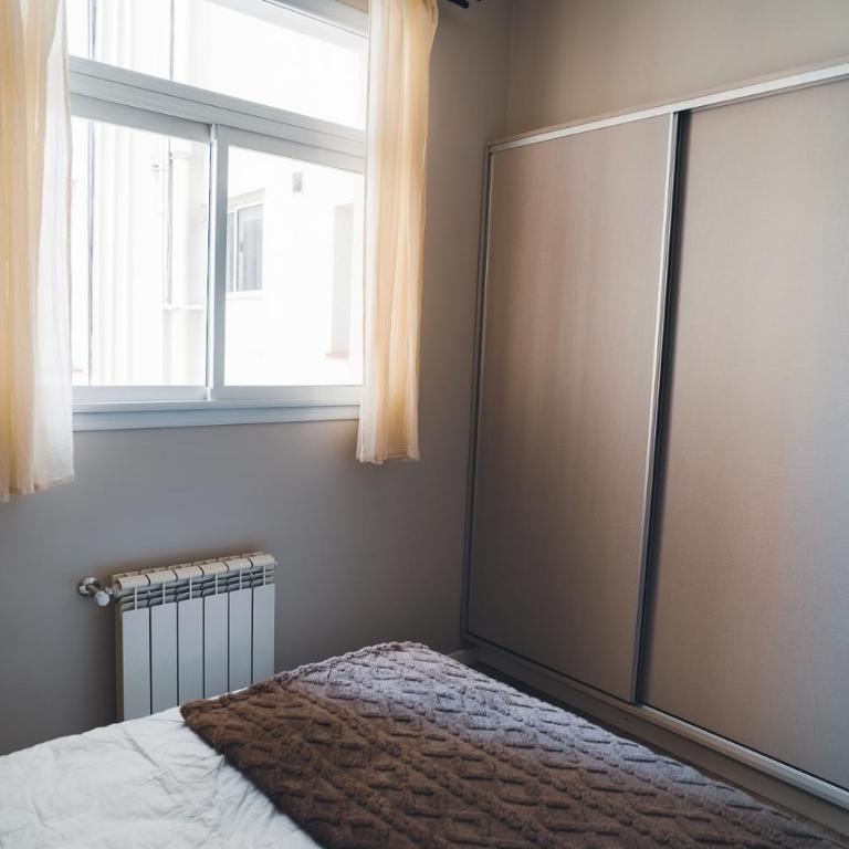 Check and Home - Gran Colon - 8 huéspedes a estrenar en zona centro - Two-Bedroom Apartment - 8