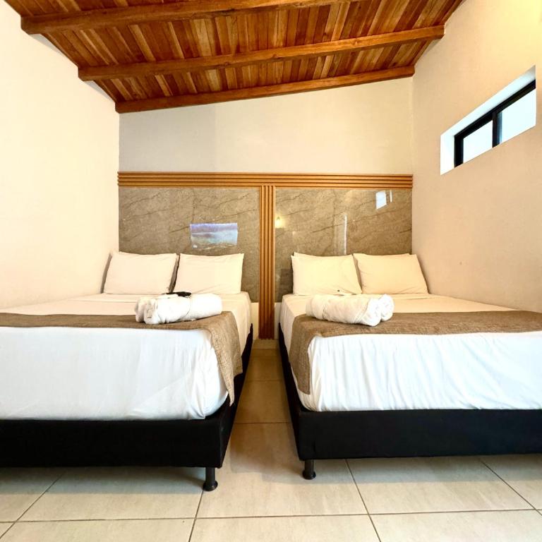 Urbanity Living - Habitación Doble Estándar con 2 camas grandes - 8