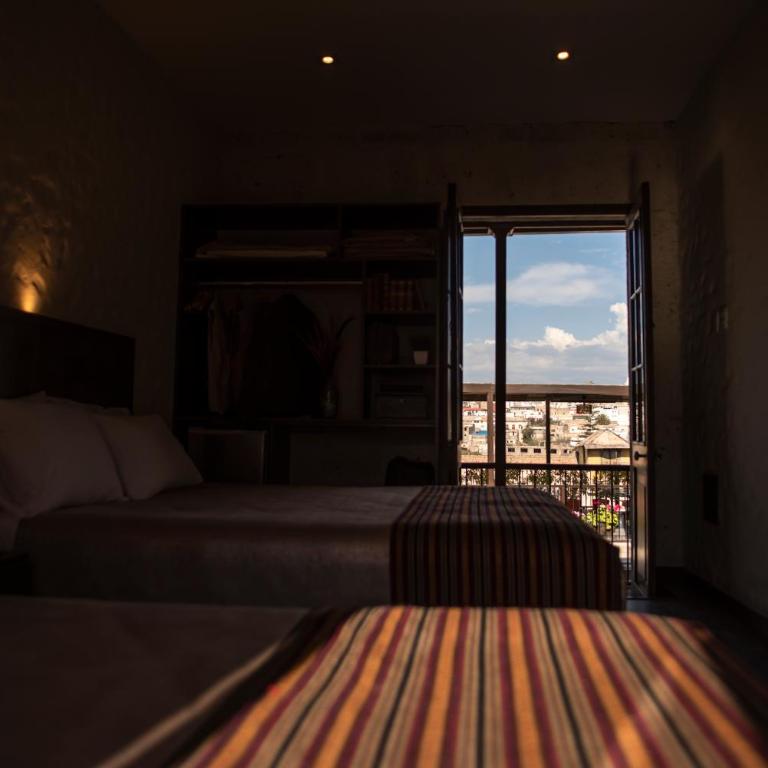 Acolpacha Tambo Boutique - Habitación Doble Deluxe - 2 camas dobles - 9