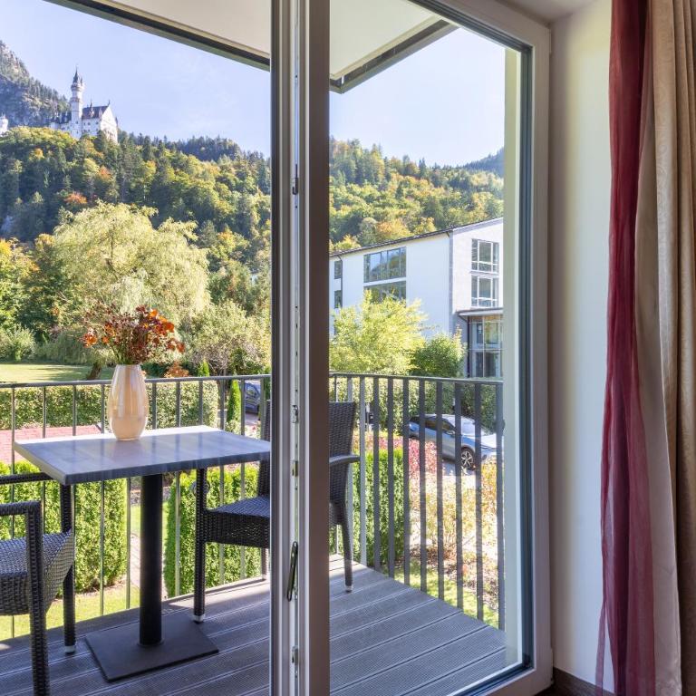 Villa Ludwig Suite Hotel - Komfort Suite mit Schlossblick - 10