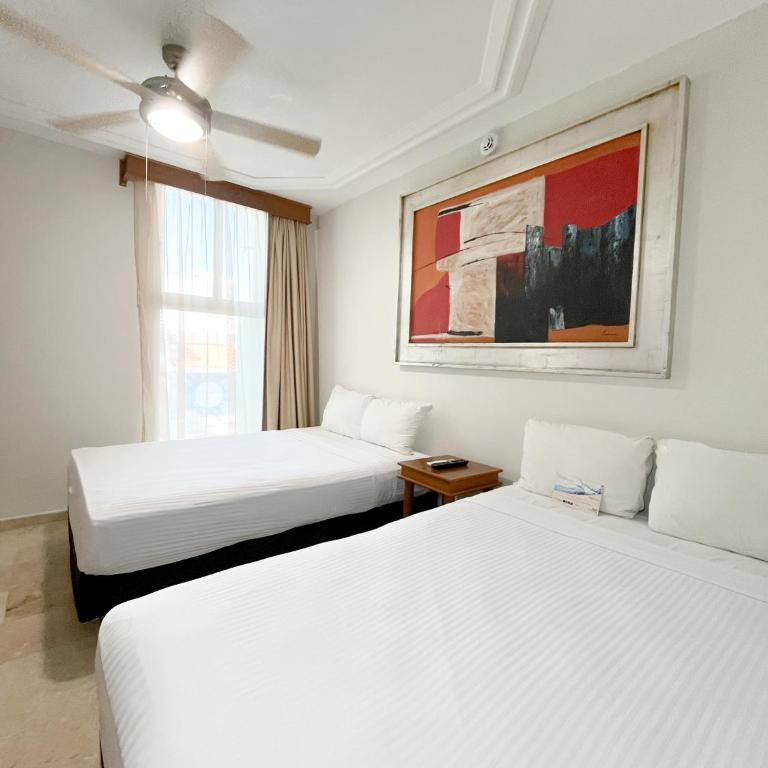 Quality Inn Mazatlan - Alojamiento con 2 camas dobles y balcón - 7