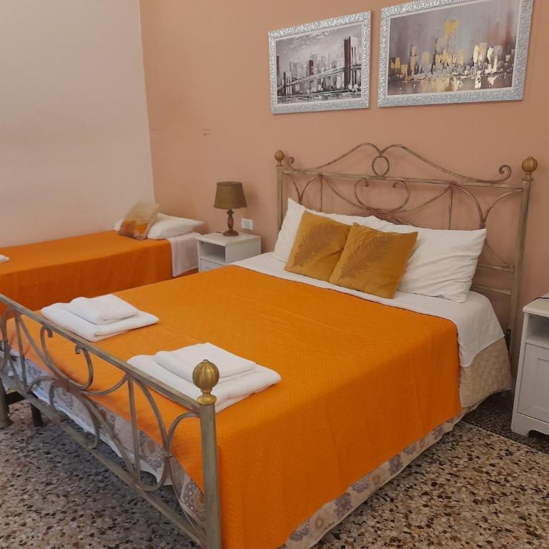 Casa Roma Affittacamere - Camera Quadrupla con Bagno Privato Esterno - 1