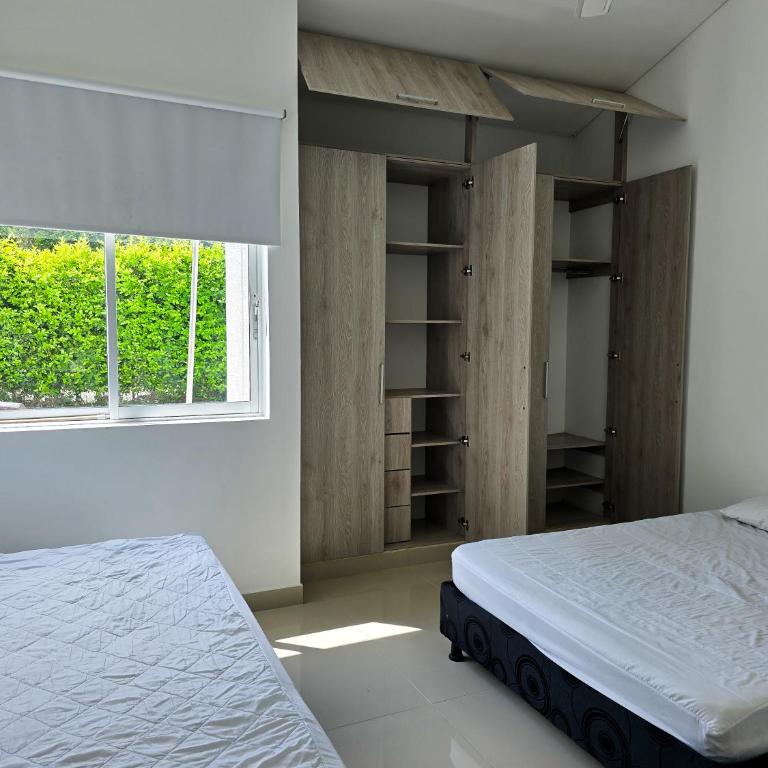 Casa de Descanso con Piscina y Jardín Ricaurte - Casa de 3 dormitorios - 8