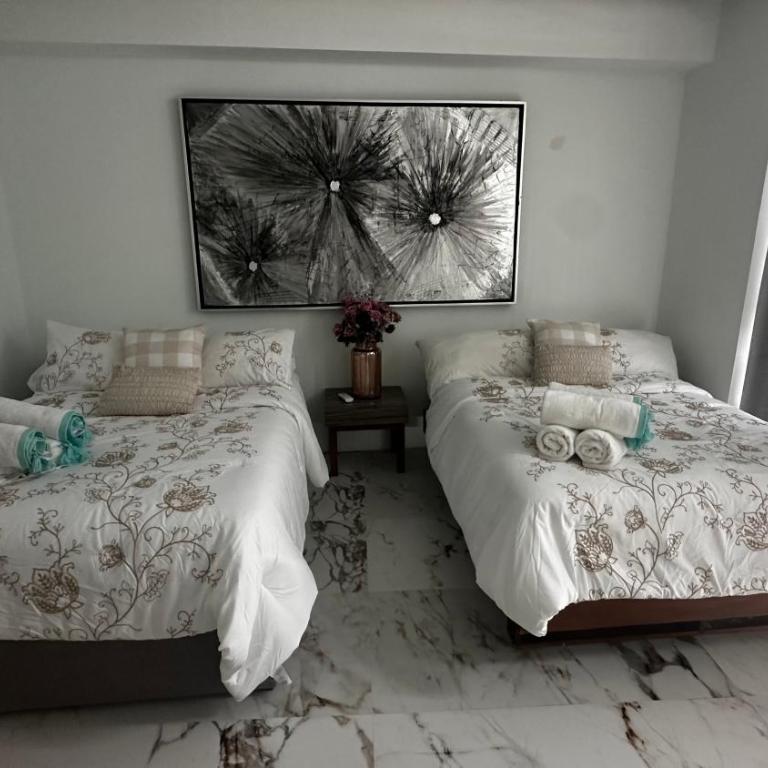 La Isla Acapulco Diamante Penthouse de Dos Pisos - Three-Bedroom Apartment - 9