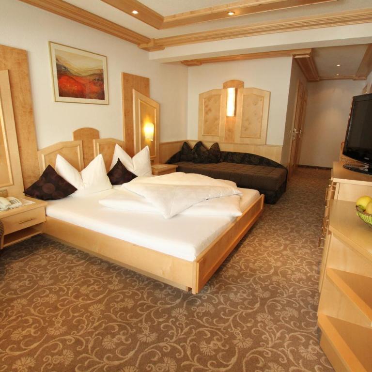 Alphotel Garni Salner - Deluxe Zimmer - 1
