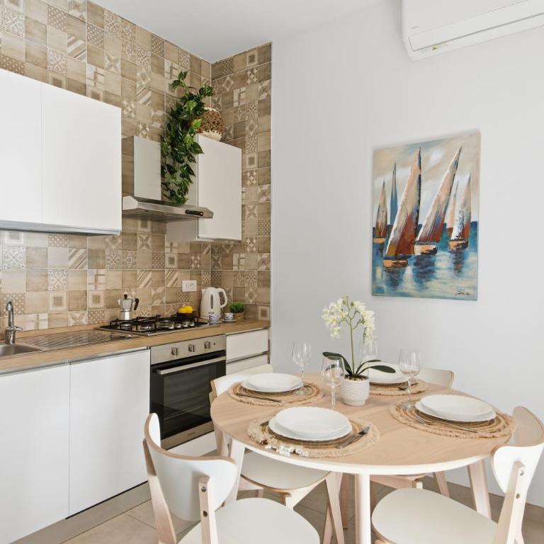 Residence Moresca , Appartamento Tavolara con Giardino e Vista Mare a 80 mt dalla Spiaggia - Appartamento con 1 Camera da Letto - Lato Mare - 12