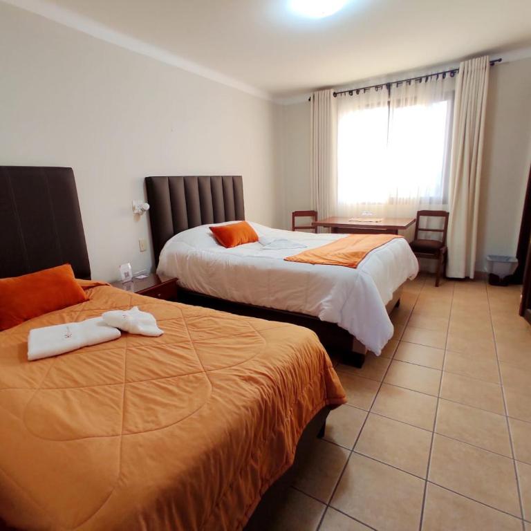 Hotel Qhawarina de Casas Kolping Bolivia S.R.L. - Standard Triple Room - 1
