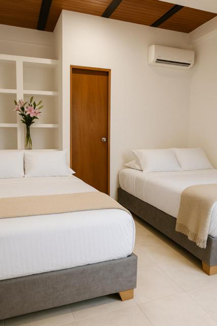 Casa Mariana Hostel Boutique - Habitación Doble Deluxe - 2 camas dobles - 3