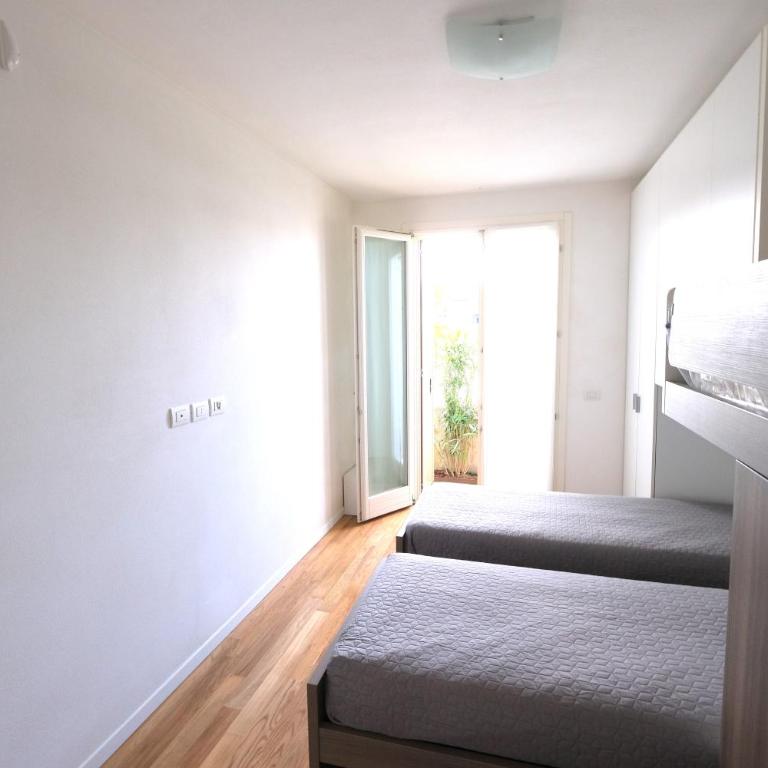 Wave Village piano terra Piazza Trieste - Appartamento con 2 Camere da Letto - 22
