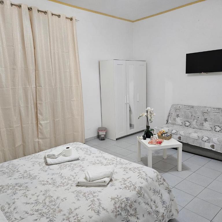 Le tre orchidee - Camera Matrimoniale con Bagno in Comune - 4