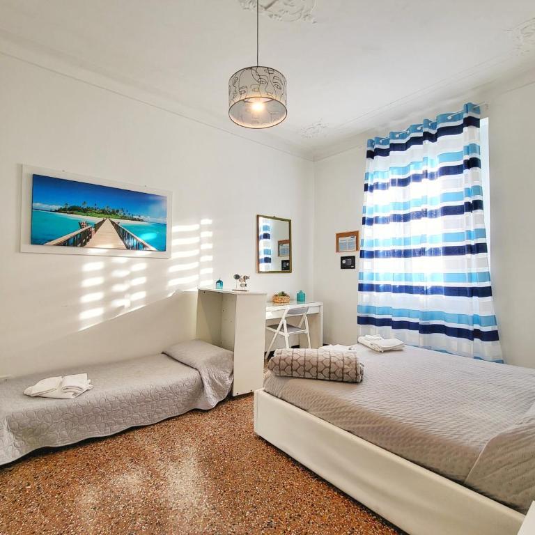 Brignole Home - Appartamento con 2 Camere da Letto e Balcone - 3